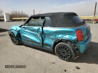 2018 MINI Convertible Cooper with VIN WMWWG5C5XJ3D00672, listed as a Copart auction lot 45905045 with 73,554 mi miles and Salvage Title. Bid and sale history available at DreamBid. Image 2.