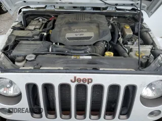2016 Jeep Wrangler Unlimited Sahara z VIN 1C4HJWEGXGL198684, wystawiony jako Copart lot #49936525 z przebiegiem 158 396 mil mil oraz Szkoda całkowita • Salvage title. Historia ofert i sprzedaży dostępna na DreamBid. Obrazek 11.