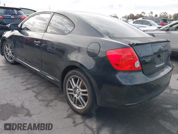 2007 Scion tC Spec with VIN JTKDE167070155986, listed as a IAAI auction lot 42062910 with 198,049 mi miles. Bid and sale history available at carsss.com. Image 3.