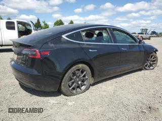 2020 Tesla Model 3 Long Range z VIN 5YJ3E1EB0LF774821, wystawiony jako Copart lot #53942934 z przebiegiem 78 809 mil mil oraz Szkoda całkowita • Salvage title. Historia ofert i sprzedaży dostępna na DreamBid. Obrazek 3.
