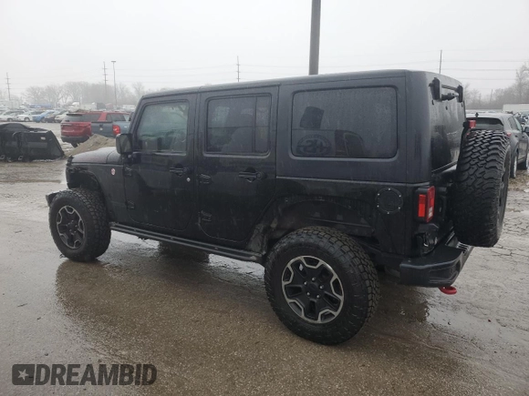 2016 Jeep Wrangler Unlimited Rubicon Hard Rock with VIN 1C4HJWFGXGL282521, listed as a Copart auction lot 43128545 with 123,074 mi miles and Salvage Title. Bid and sale history available at carsss.com. Image 2.