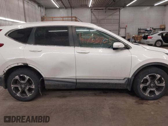 2017 Honda CR-V Touring with VIN 2HKRW2H94HH685350, listed as a IAAI auction lot 41753725 with 75,749 mi miles. Bid and sale history available at carsss.com. Image 14.