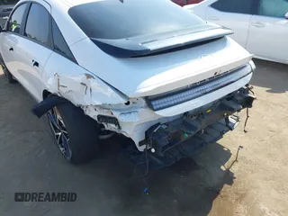 2023 Hyundai Ioniq 6 SEL z VIN KMHM34AA0PA028579, wystawiony jako IAAI lot #42171621 z przebiegiem 24 606 mil mil oraz . Historia ofert i sprzedaży dostępna na DreamBid. Obrazek 6.