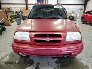 1999 Suzuki Vitara JLS z VIN 2S3TE52V6X6110719, wystawiony jako Copart lot #44219825 z przebiegiem 190 311 mil mil oraz Szkoda całkowita • Salvage title. Historia ofert i sprzedaży dostępna na DreamBid. Obrazek 5.