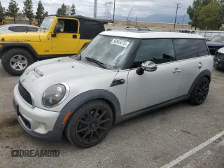 2011 MINI Clubman S z VIN WMWZG3C57BTY36897, wystawiony jako Copart lot #56803475 z przebiegiem 193 734 mil mil oraz Czysty tytuł • Clean title. Historia ofert i sprzedaży dostępna na DreamBid. Obrazek 1.