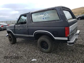 1986 Ford Bronco Custom with VIN 1FMEU15H7GLB19165, listed as a Copart auction lot 71802554 with 81,444 mi miles and Salvage Title. Bid and sale history available at carsss.com. Image 2.