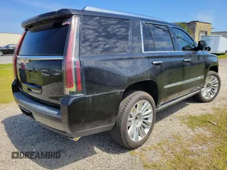 2019 Cadillac Escalade Platinum with VIN 1GYS4DKJ9KR138333, listed as a IAAI auction lot 42176170 with 104,787 mi miles and . Bid and sale history available at DreamBid. Image 4.