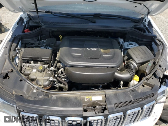 2019 Jeep Grand Cherokee Altitude with VIN 1C4RJEAG9KC662240, listed as a Copart auction lot 52871935 with 123,188 mi miles and Salvage title. Bid and sale history available at DreamBid. Image 13.