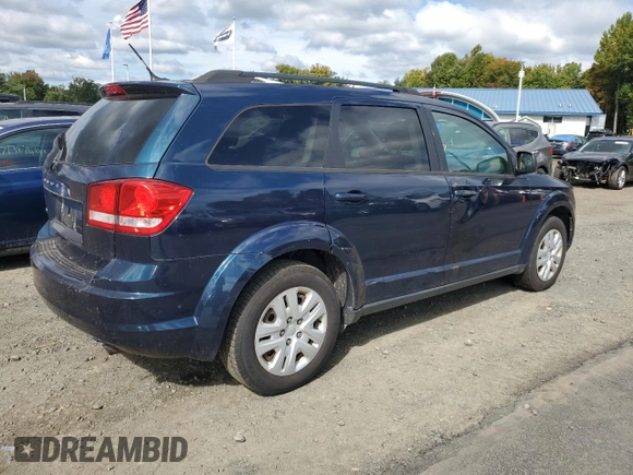 2014 Dodge Journey American Value Pkg with VIN 3C4PDCAB4ET141734, listed as a Copart auction lot 73952994 with 168,801 mi miles and Clean Title. Bid and sale history available at carsss.com. Image 3.