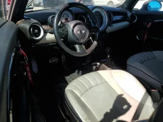2011 MINI Convertible S с VIN WMWZP3C59BT249133, выставлен на аукционе Copart как лот 56402615 с пробегом 103 809 миль миль и Списание • Salvage title. История ставок и продаж доступна на DreamBid. Изображение 8.