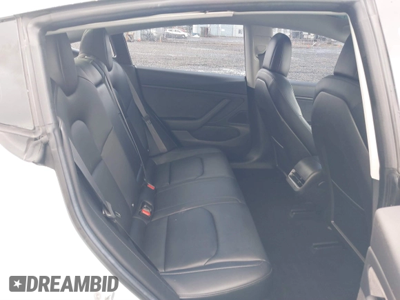 2018 Tesla Model 3 Long Range Battery with VIN 5YJ3E1EA3JF013253, listed as a IAAI auction lot 41752102 with 84,459 mi miles. Bid and sale history available at carsss.com. Image 8.
