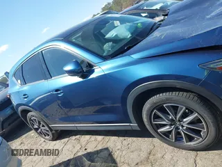 2017 Mazda CX-5 Grand Touring with VIN JM3KFADL8H0105518, listed as a IAAI auction lot 41876779 with 82,540 mi miles. Bid and sale history available at carsss.com. Image 13.