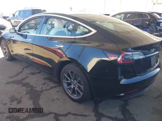 2020 Tesla Model 3 Standard Range Plus with VIN 5YJ3E1EA8LF661982, listed as a IAAI auction lot 41700109 with 30,271 mi miles and . Bid and sale history available at DreamBid. Image 3.