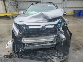 2024 Toyota RAV4 Hybrid XLE Premium with VIN 4T3B6RFV9RU167402, listed as a Copart auction lot 89083875 with 5,923 mi miles and Salvage Title. Bid and sale history available at DreamBid. Image 12.