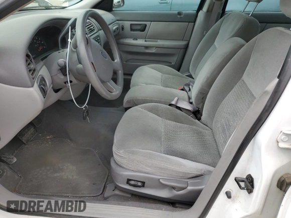 2004 Ford Taurus SE with VIN 1FAFP53U44G112756, listed as a Copart auction lot 50051375 with 93,545 mi miles and Salvage Title. Bid and sale history available at DreamBid. Image 7.