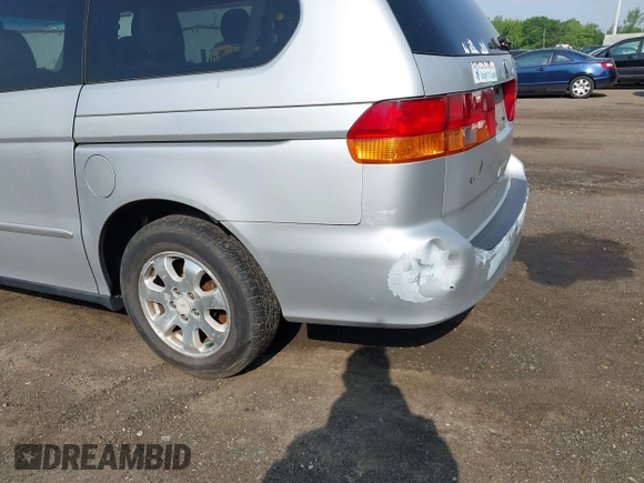 2002 Honda Odyssey EX-L z VIN 2HKRL18062H533064, wystawiony jako IAAI lot #42273694 z przebiegiem Nie podano mil oraz . Historia ofert i sprzedaży dostępna na DreamBid. Obrazek 6.