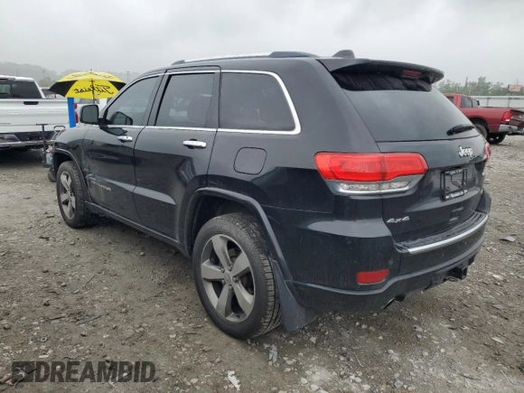 2015 Jeep Grand Cherokee Overland with VIN 1C4RJFCT2FC762573, listed as a Copart auction lot 59123275 with 229,128 mi miles and Salvage title. Bid and sale history available at DreamBid. Image 2.