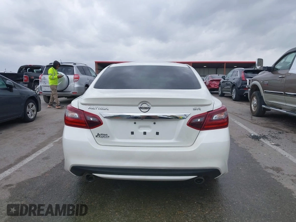 2017 Nissan Altima SR with VIN 1N4AL3AP0HN345977, listed as a IAAI auction lot 41937530 with 121,292 mi miles and . Bid and sale history available at carsss.com. Image 16.