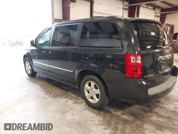 2010 Dodge Grand Caravan SXT with VIN 2D4RN5D19AR433481, listed as a IAAI auction lot 42123049 with 134,882 mi miles and . Bid and sale history available at DreamBid. Image 3.