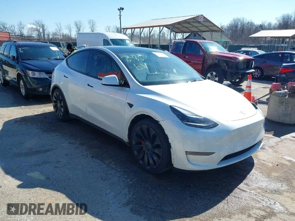 2021 Tesla Model Y Performance with VIN 5YJYGDEF8MF246658, listed as a IAAI auction lot 41679793 with 28,015 mi miles and . Bid and sale history available at DreamBid. Image 1.