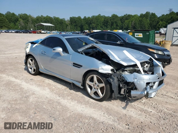 2014 Mercedes-Benz SLK 250 with VIN WDDPK4HA6EF077432, listed as a Copart auction lot 58894045 with 112,551 mi miles and Salvage title. Bid and sale history available at DreamBid. Image 4.