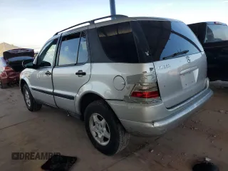 2000 Mercedes-Benz M-Class with VIN 4JGAB54E1YA193102, listed as a Copart auction lot 74294404 with 202,107 mi miles and Salvage Title. Bid and sale history available at carsss.com. Image 2.