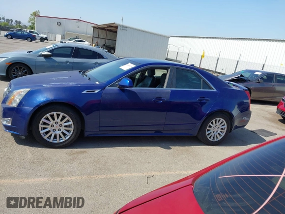 2012 Cadillac CTS Luxury with VIN 1G6DE5E59C0102621, listed as a IAAI auction lot 42554121 with 128,430 mi miles and . Bid and sale history available at DreamBid. Image 14.