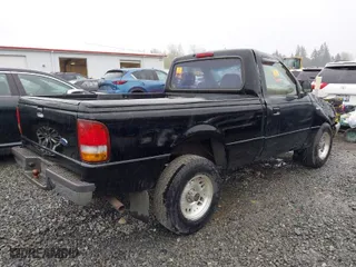 1996 Ford Ranger XL with VIN 1FTCR10A8TPA03077, listed as a IAAI auction lot 41999955 with 179,853 mi miles. Bid and sale history available at carsss.com. Image 4.