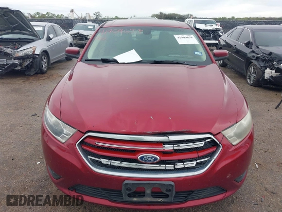 2015 Ford Taurus SEL with VIN 1FAHP2E8XFG137526, listed as a IAAI auction lot 41909658 with 147,992 mi miles and . Bid and sale history available at carsss.com. Image 12.