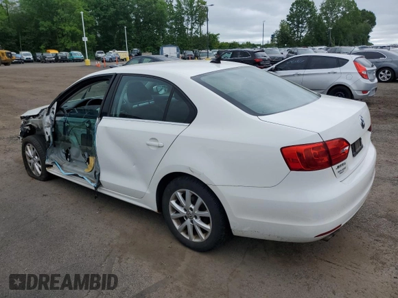 2013 Volkswagen Jetta SE z VIN 3VWDP7AJ0DM219473, wystawiony jako Copart lot #57700105 z przebiegiem 135 832 mil mil oraz Szkoda całkowita • Salvage title. Historia ofert i sprzedaży dostępna na DreamBid. Obrazek 2.
