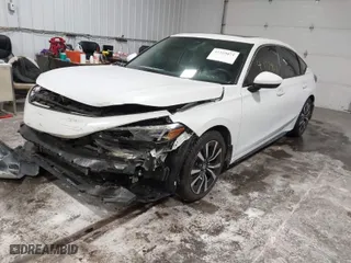 2022 Honda Civic Hatchback EX-L with VIN 19XFL1H73NE013106, listed as a IAAI auction lot 41559071 with 38,219 mi miles. Bid and sale history available at carsss.com. Image 2.
