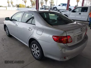 2010 Toyota Corolla with VIN JTDBU4EE2A9107184, listed as a IAAI auction lot 41861299 with 192,519 mi miles. Bid and sale history available at carsss.com. Image 3.