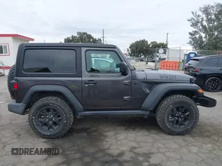 2022 Jeep Wrangler Willys Sport with VIN 1C4GJXAN7NW252931, listed as a IAAI auction lot 40972143 with 12,823 mi miles and . Bid and sale history available at DreamBid. Image 13.