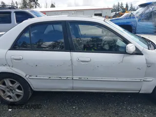 2002 Mazda Protege DX with VIN JM1BJ225520542854, listed as a IAAI auction lot 41955679 with 161,338 mi miles and . Bid and sale history available at DreamBid. Image 13.