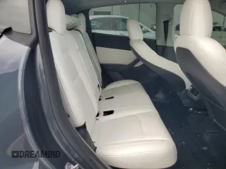 2022 Tesla Model Y Performance с VIN 7SAYGDEF0NF497582, выставлен на аукционе Copart как лот 65131685 с пробегом 50 948 миль миль и Чистый • Clean title. История ставок и продаж доступна на DreamBid. Изображение 11.