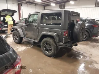 2018 Jeep Wrangler Sport S with VIN 1C4AJWAG2JL836246, listed as a IAAI auction lot 41661489 with 87,443 mi miles and . Bid and sale history available at DreamBid. Image 3.