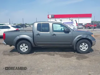 2005 Nissan Frontier LE with VIN 1N6AD07W35C438405, listed as a IAAI auction lot 42469804 with 128,472 mi miles and . Bid and sale history available at DreamBid. Image 14.