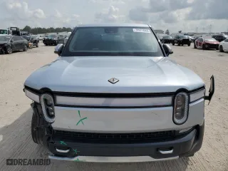 2023 Rivian R1T Adventure with VIN 7FCTGAAA1PN020612, listed as a Copart auction lot 72971044 with 7,858 mi miles and Salvage Title. Bid and sale history available at carsss.com. Image 5.