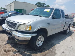 2000 Ford F-150 XL with VIN 1FTRX18L1YNA13975, listed as a IAAI auction lot 42397187 with 235,471 mi miles and . Bid and sale history available at DreamBid. Image 6.