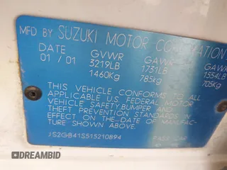 2001 Suzuki Esteem GL z VIN JS2GB41S515210894, wystawiony jako IAAI lot #42234772 z przebiegiem 180 182 mil mil oraz . Historia ofert i sprzedaży dostępna na DreamBid. Obrazek 9.