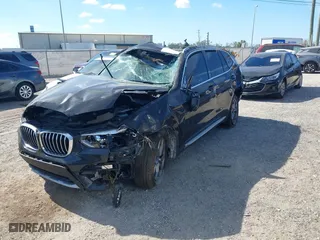 2020 BMW X3 sDrive30i with VIN 5UXTY3C03L9D58004, listed as a IAAI auction lot 40703189 with 1 mi miles. Bid and sale history available at carsss.com. Image 2.