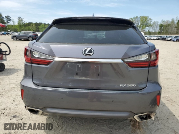 2018 Lexus RX 350 z VIN 2T2BZMCA2JC163021, wystawiony jako Copart lot #52337205 z przebiegiem 61 057 mil mil oraz Szkoda całkowita • Salvage title. Historia ofert i sprzedaży dostępna na DreamBid. Obrazek 6.