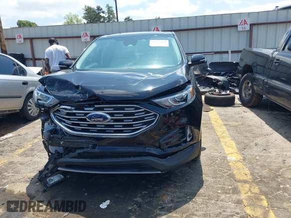 2021 Ford Edge Titanium z VIN 2FMPK3K96MBA16046, wystawiony jako IAAI lot #42137419 z przebiegiem 88 622 mil mil oraz . Historia ofert i sprzedaży dostępna na DreamBid. Obrazek 6.