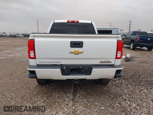 2018 Chevrolet Silverado 1500 High Country with VIN 3GCUKTEC1JG331991, listed as a IAAI auction lot 41718084 with 120,924 mi miles and . Bid and sale history available at DreamBid. Image 16.