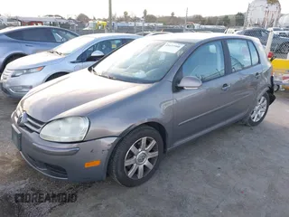 2007 Volkswagen Rabbit with VIN WVWDS71K67W205723, listed as a IAAI auction lot 41637560 with 156,127 mi miles. Bid and sale history available at carsss.com. Image 2.