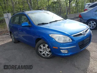 2010 Hyundai Elantra Touring SE with VIN KMHDC8AE0AU052512, listed as a IAAI auction lot 42123818 with 243,070 mi miles. Bid and sale history available at carsss.com. Image 1.
