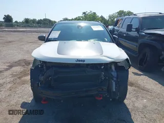 2021 Jeep Compass Trailhawk with VIN 3C4NJDDB7MT564467, listed as a IAAI auction lot 42330939 with 76,963 mi miles and . Bid and sale history available at DreamBid. Image 12.