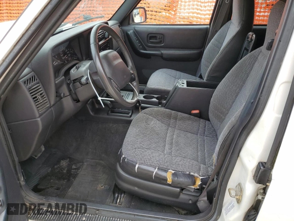 2001 Jeep Cherokee Sport with VIN 1J4FF48S31L520760, listed as a Copart auction lot 59807625 with 298,489 mi miles and Salvage title. Bid and sale history available at DreamBid. Image 7.