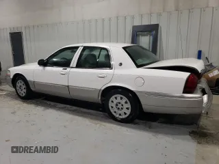 2005 Mercury Grand Marquis GS z VIN 2MEFM74W05X612471, wystawiony jako Copart lot #49455195 z przebiegiem 140 916 mil mil oraz Szkoda całkowita • Salvage title. Historia ofert i sprzedaży dostępna na DreamBid. Obrazek 2.