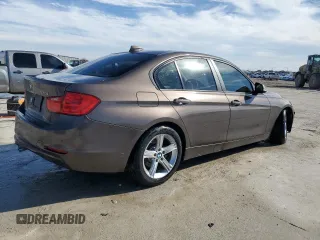 2015 BMW 3 Series 328i with VIN WBA3A5G58FNS88853, listed as a Copart auction lot 42785375 with 129,918 mi miles and Salvage title. Bid and sale history available at DreamBid. Image 3.